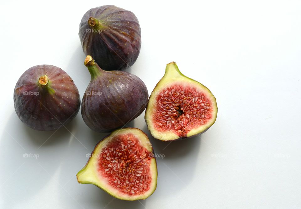 fresh figs fruits white background