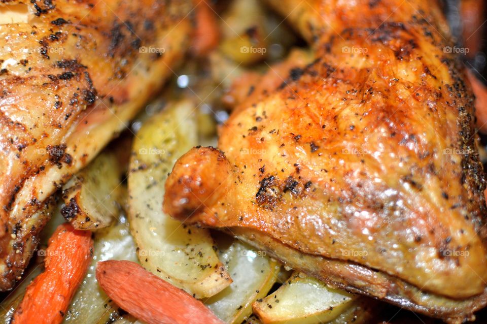 Baked chicken with potatoes and carrots