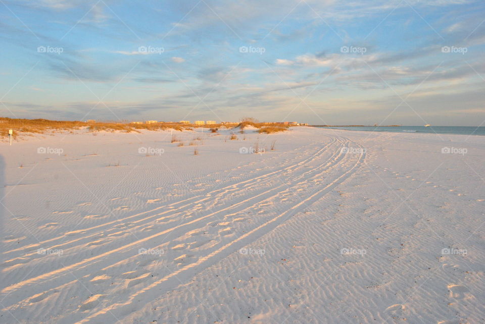 Walking on the beach at sunset