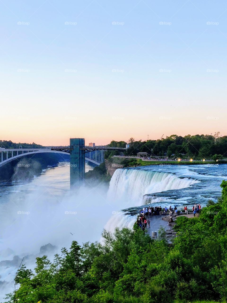 Rainbow bridge :USA -Canada border view from end point of niagra falls from usa side 
love the colour of sky 
picture perfect beauty