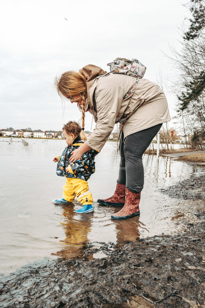 mother and son explore lake