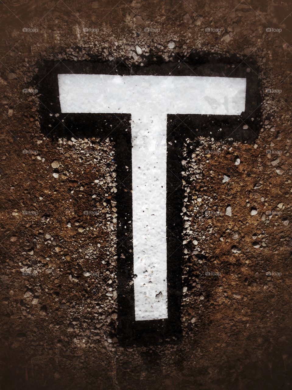 Graffiti Letter T On The Tarmac