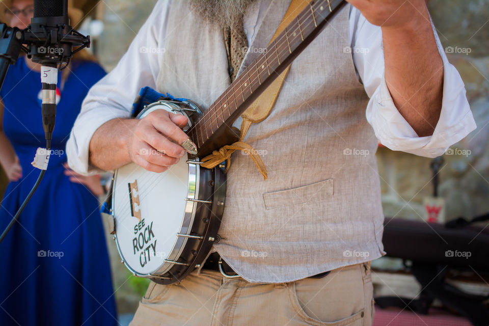 Man with a Beard Playing Banjo