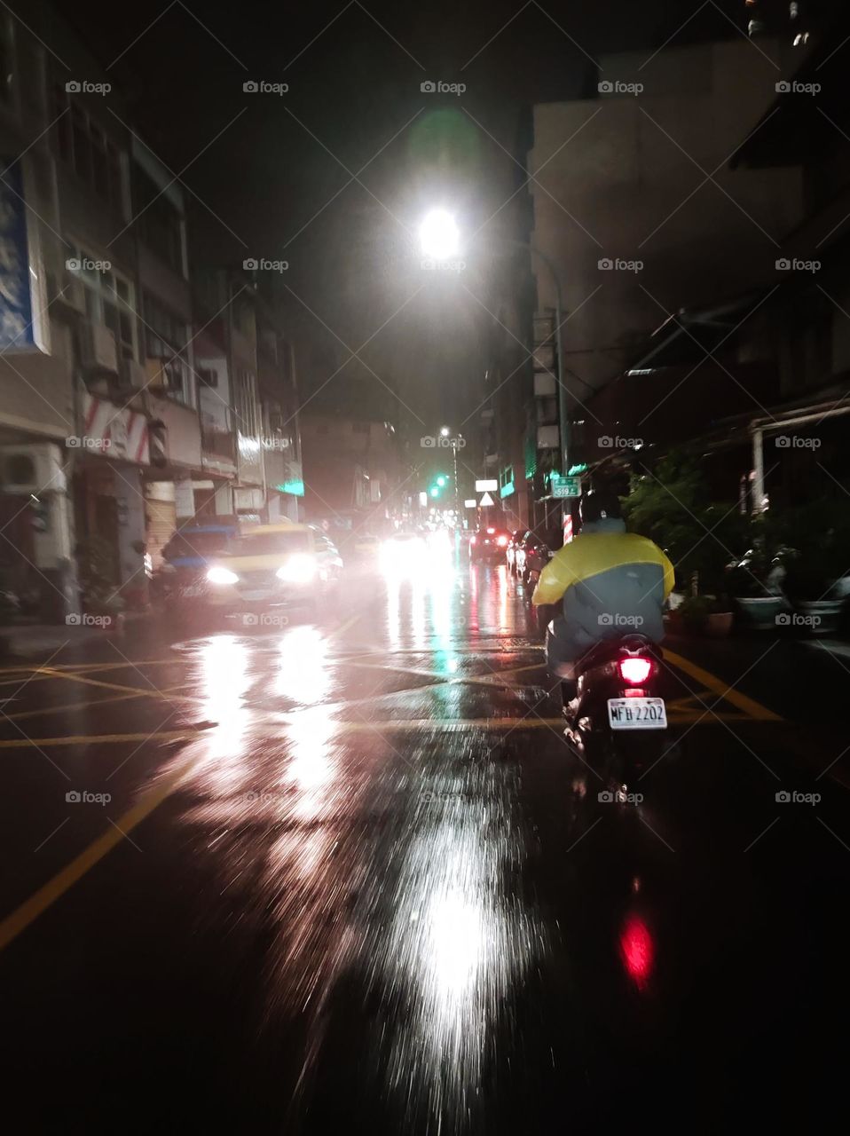 Motorcycle riding in the rain