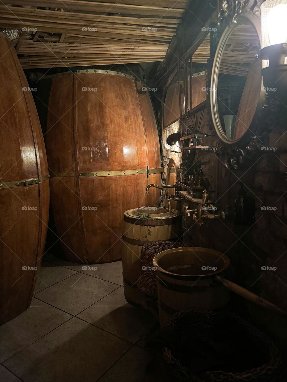 In the cellar there is a barrel of wine