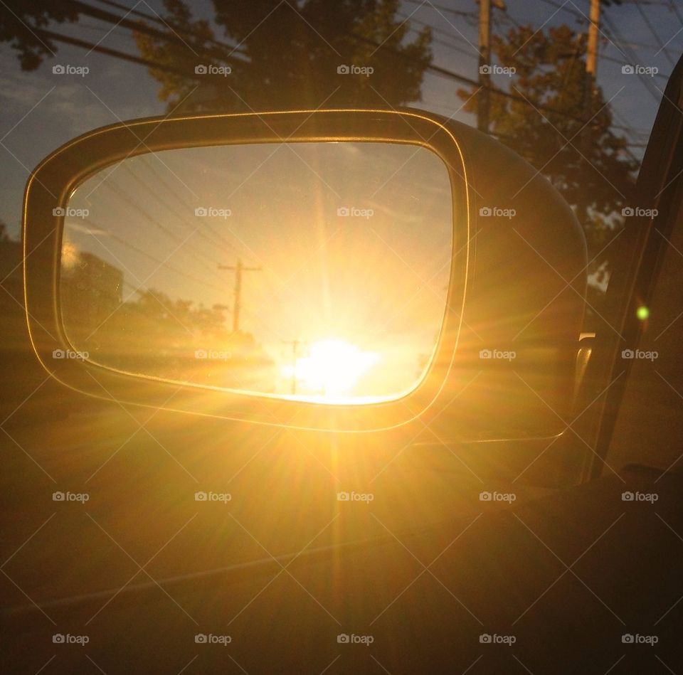 Sunsetting in my rear view mirror 