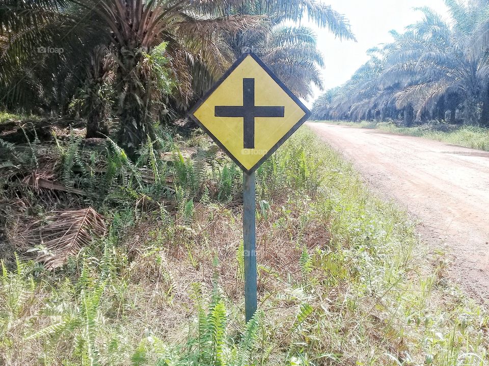 Traffic Signs.The sign is to user notify road users that there is an intersection in front
