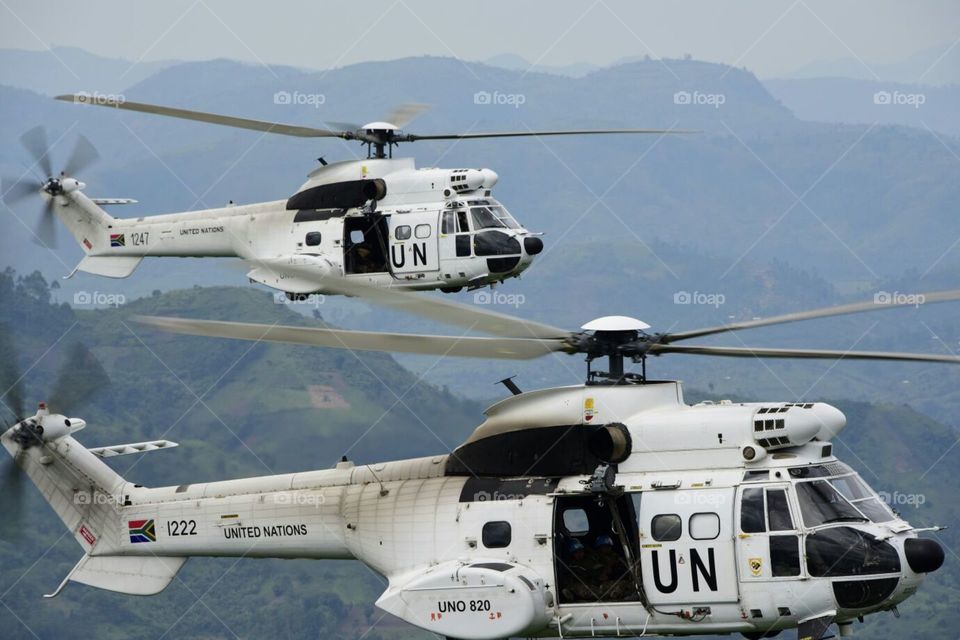 Flying together-a group of UN choppers flying over the hinterlands in Congo