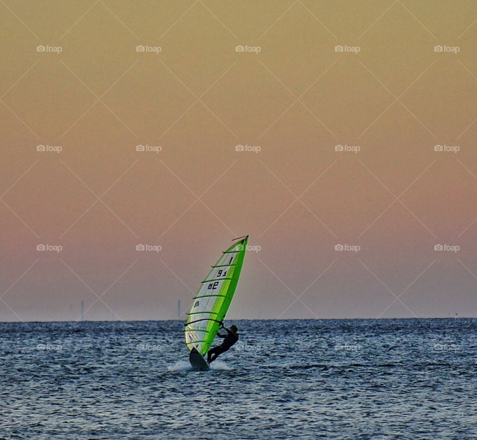 Windsurfing at dusk