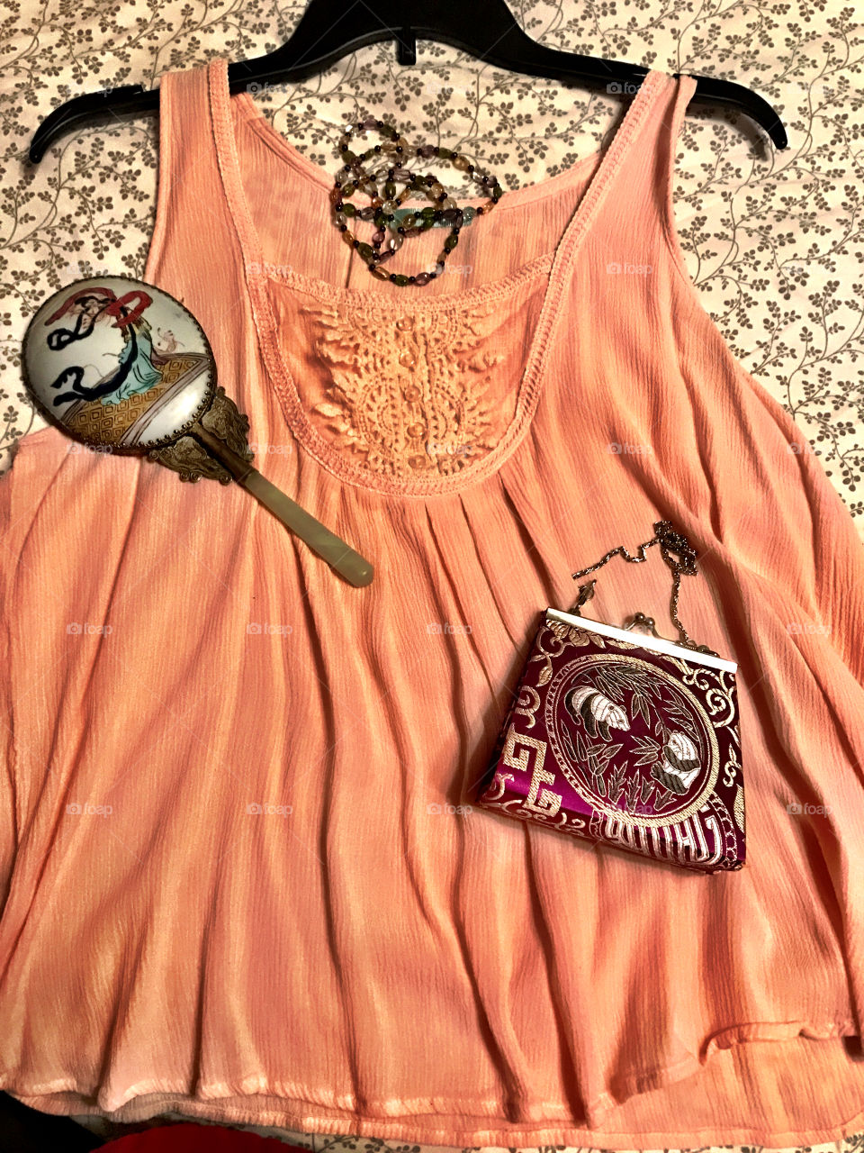 Favorite shirt, vintage mirror, and Panda purse