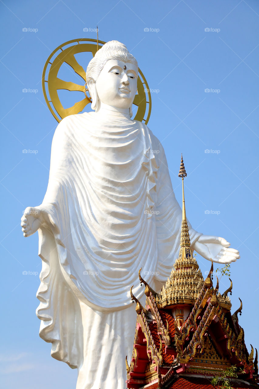 Big standing buddha​ statue​ located​ in​ Bangping temple, Thailand.