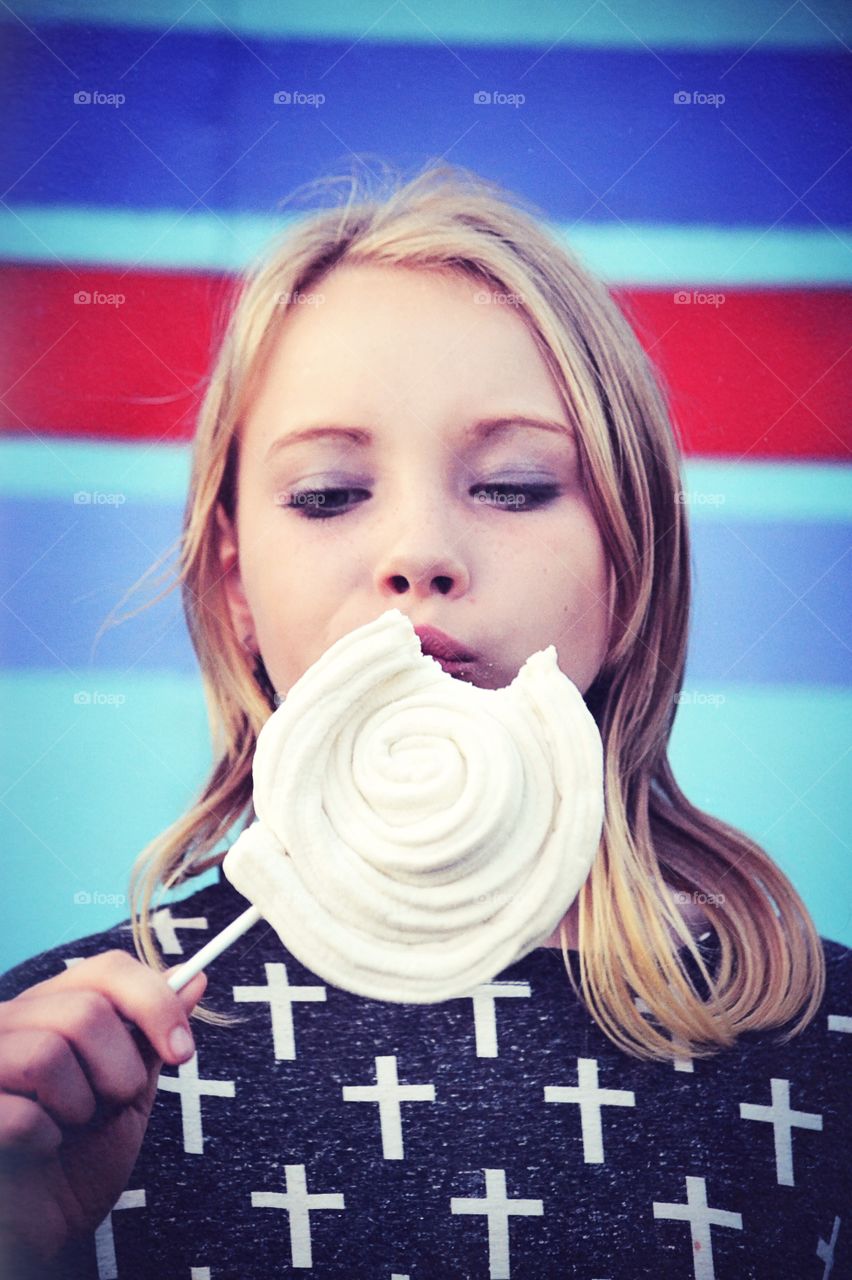 Girl eating lollipop