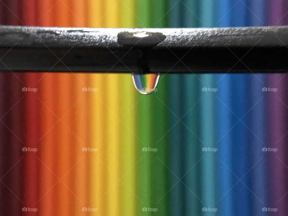 Drop of water and rainbow.