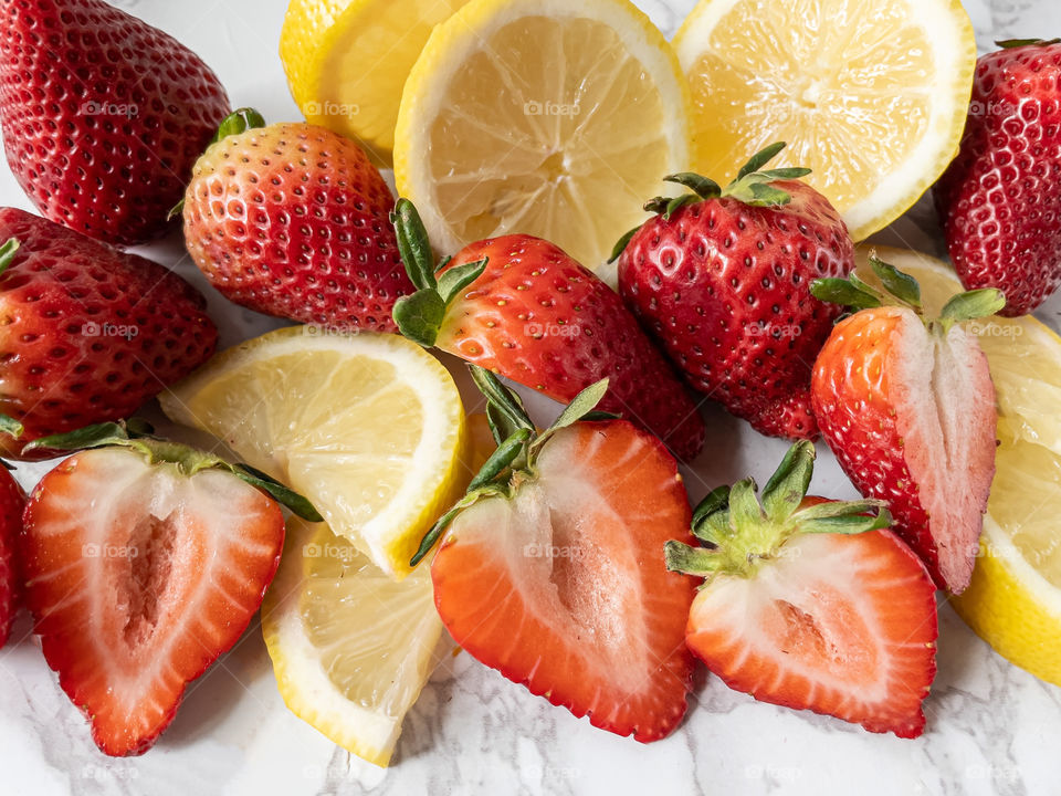 Fresh strawberries and lemons 