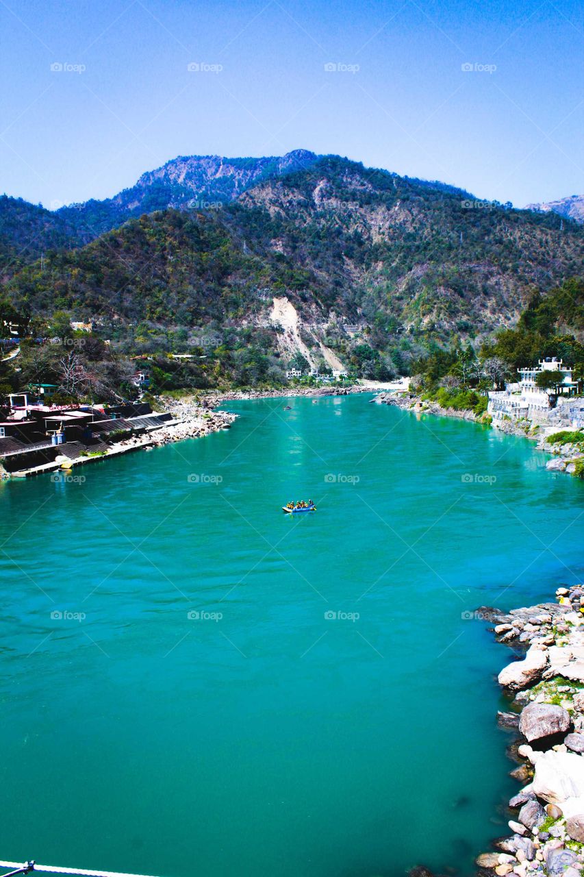 Blue water, Mountains, Pure vibe,clear sky.... This is called Nature Treasure. picture taken in Rishikesh,India