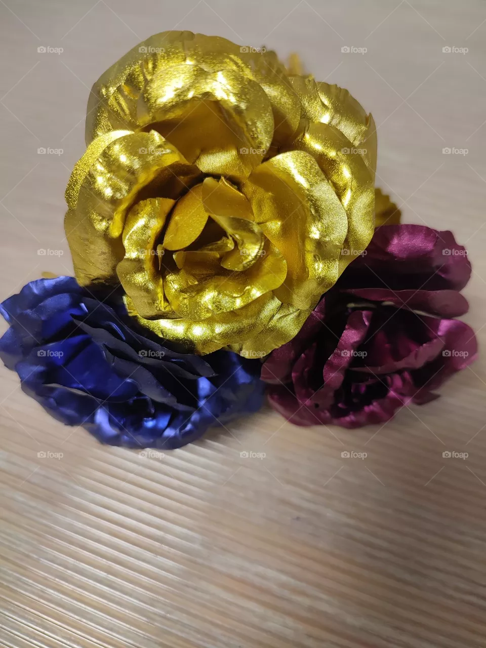 Flower, a rose, blue , gold , red