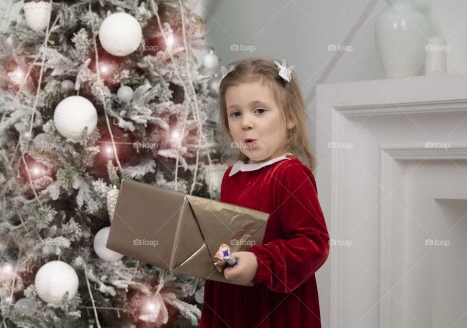 child holding a gift