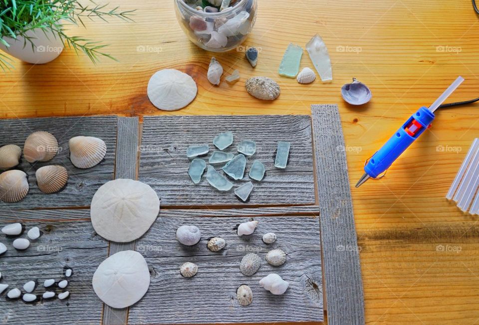 Doing a craft with beach combing finds