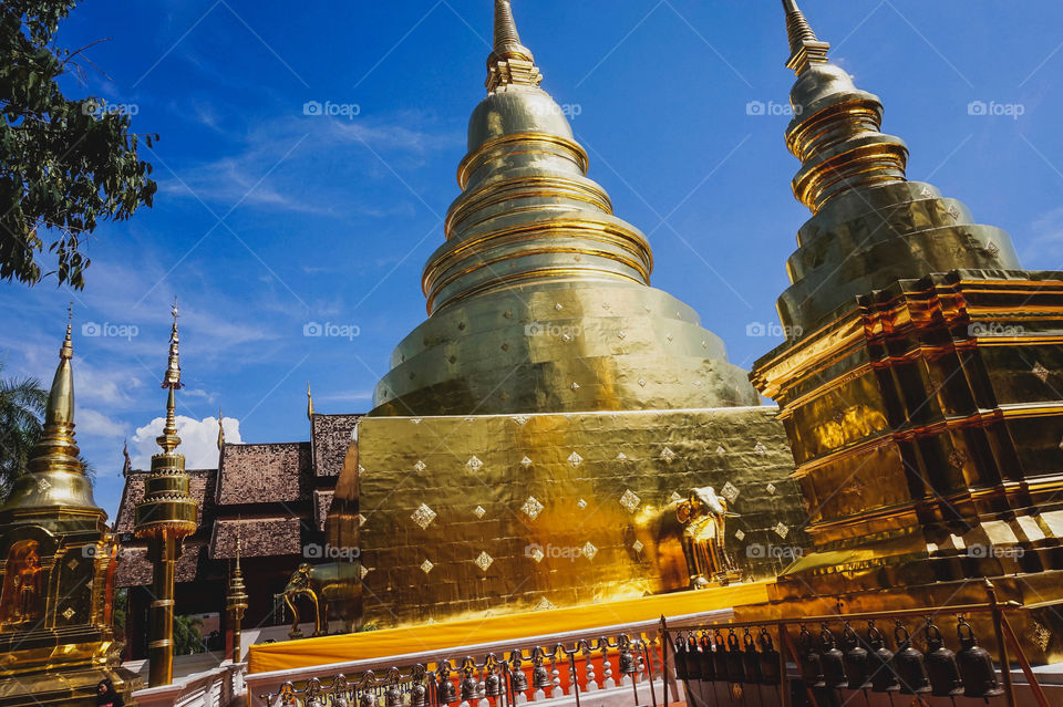 Massive golden stupa of Wat Phra Singh in Chiang Mai, Thailand 