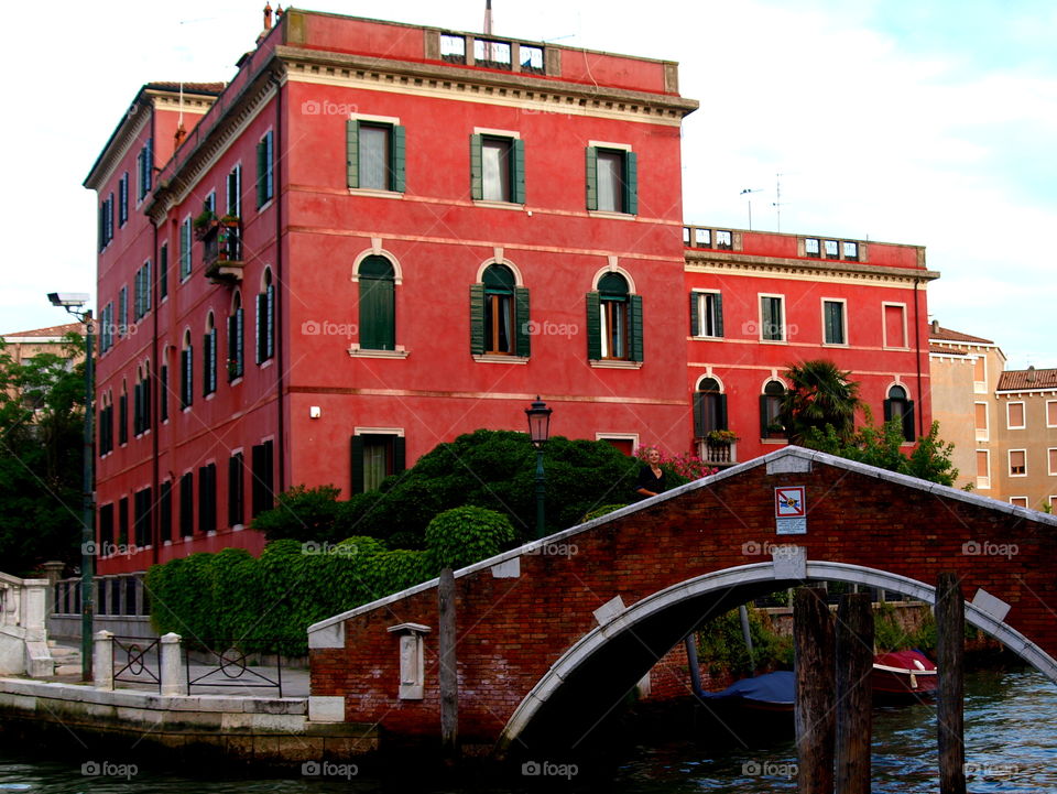 red house on a canal