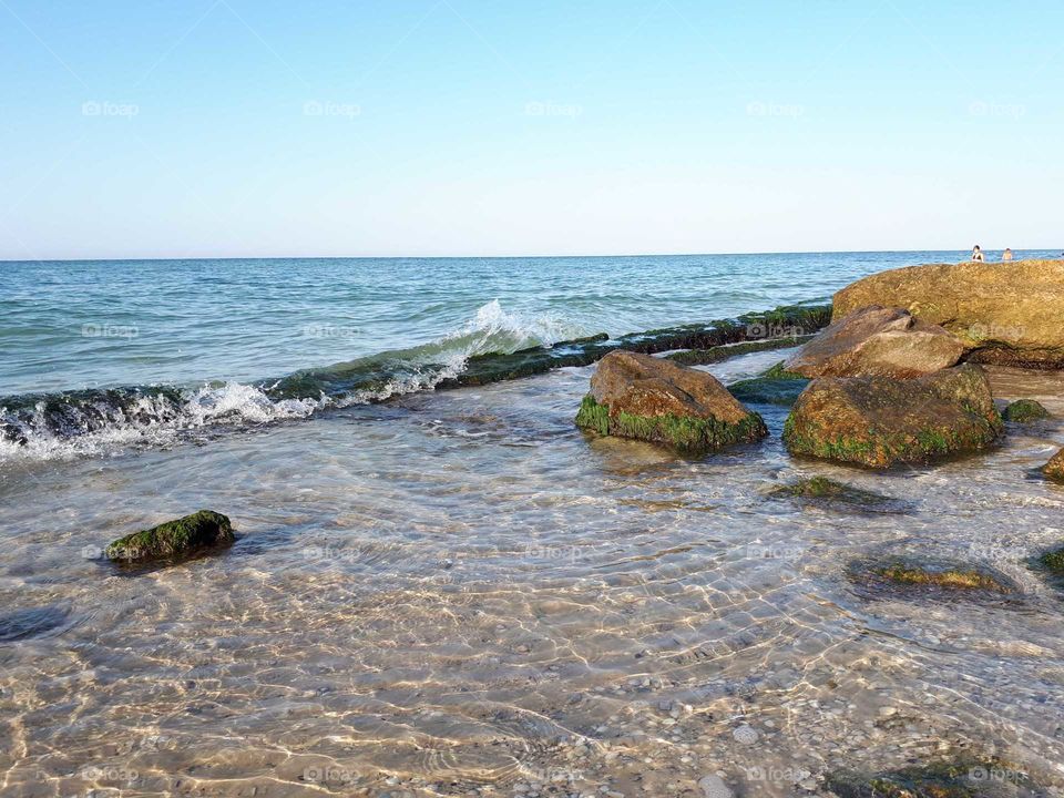 Sand beach with rocks