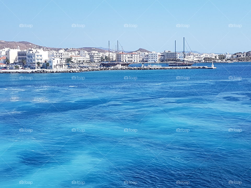 turquoise waters of the beach and clouds island