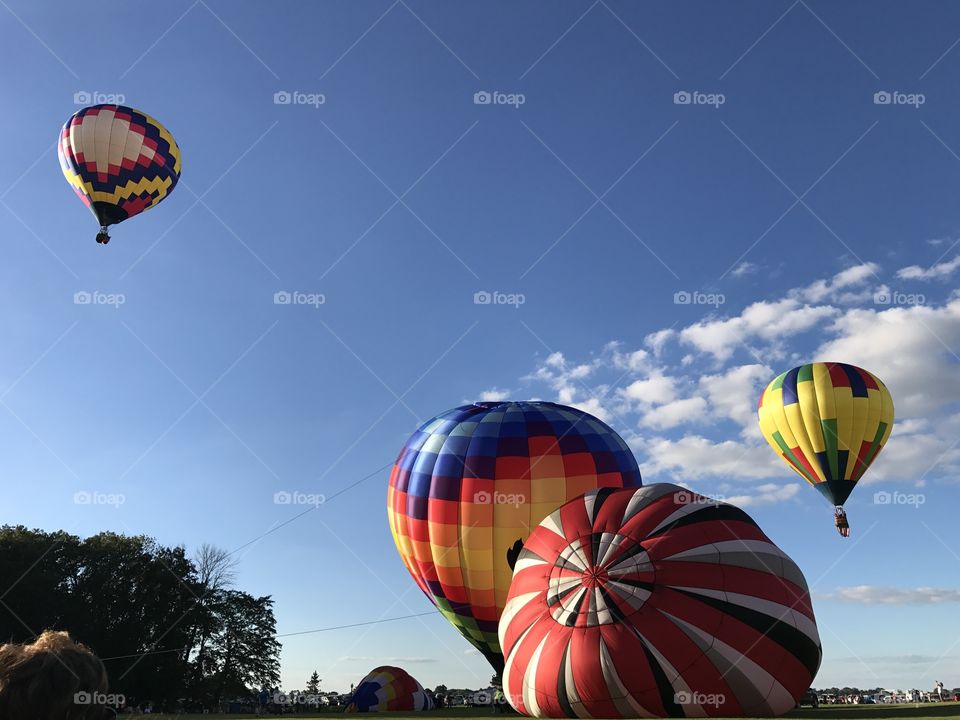 Inflating hot air balloons 