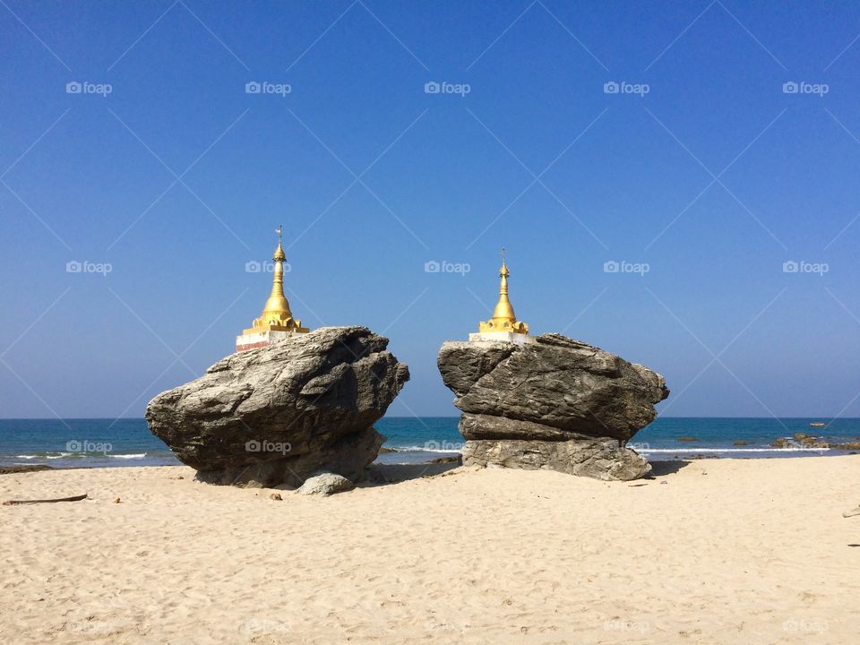 Pagodas on rocks on the beach