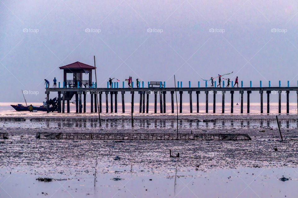 Enjoy on the bridge in sunset moment
