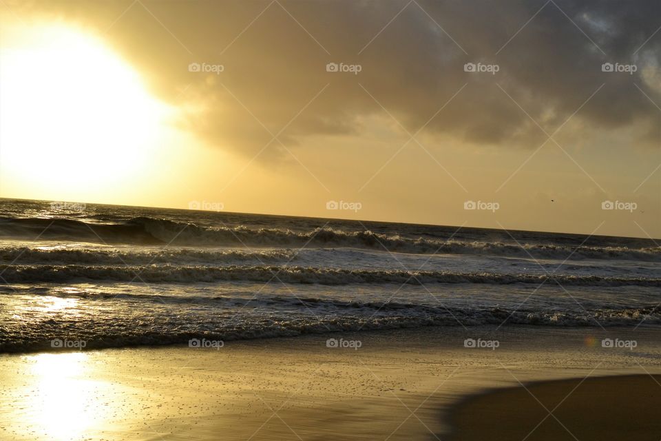 Stormy sunset on the beach 