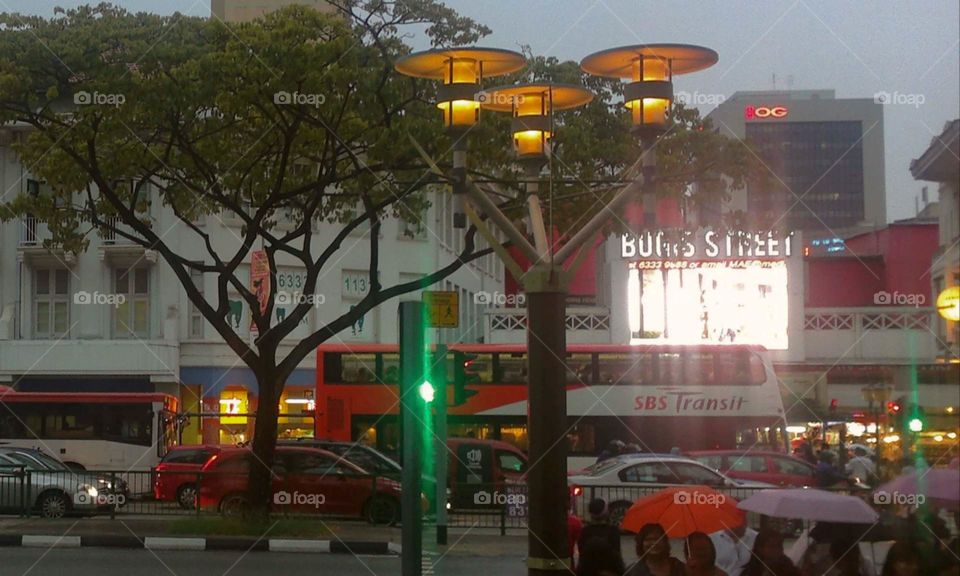 4pm, cloudy, Singapore has big bold to conquer the sun light with their street lamps.. and another city lights source.