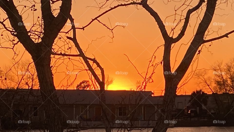 Great evening for Sunset Sun still high with Yellow Highlights around Center. Evening Backlit glow dominate across the sky. 
