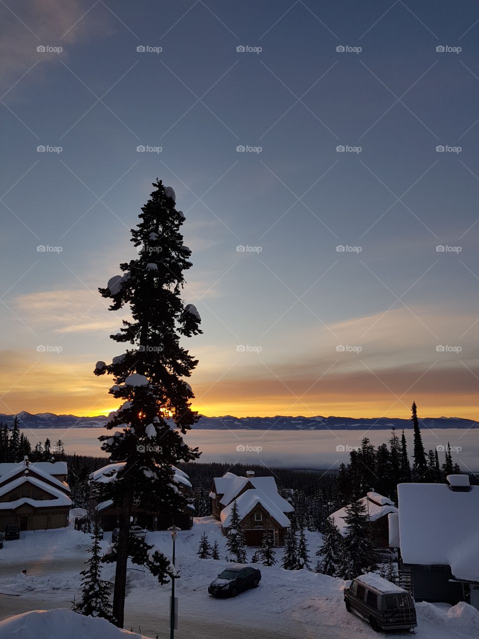 Sunrise from the chalet looking over the valley with inverted cloud layer