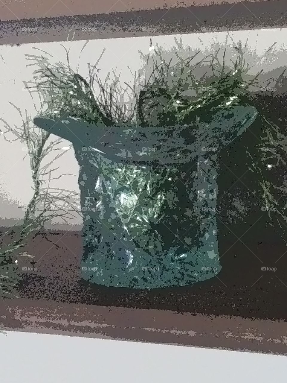 tinsel in a glass hat