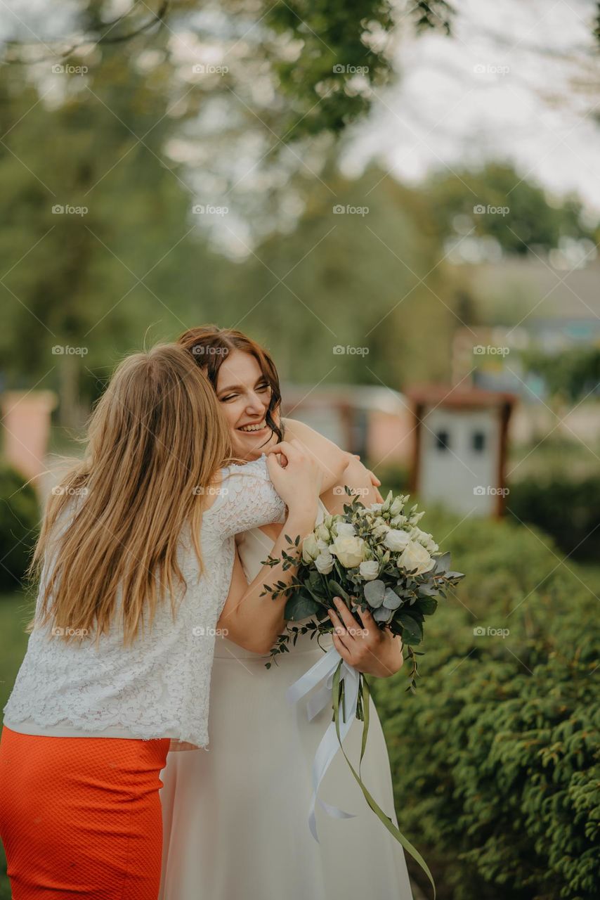 Warm hugs from a childhood friend and a happy bride