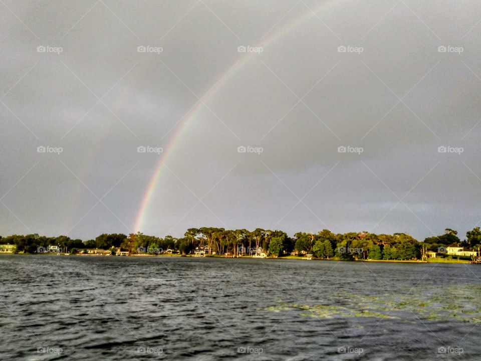 rainbow over lake