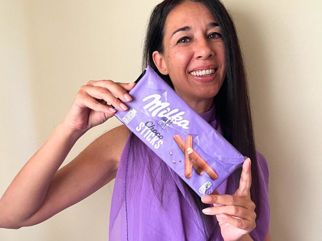 Energetic, Light - Hearted Portrait of Beautiful Smiling Woman with Products