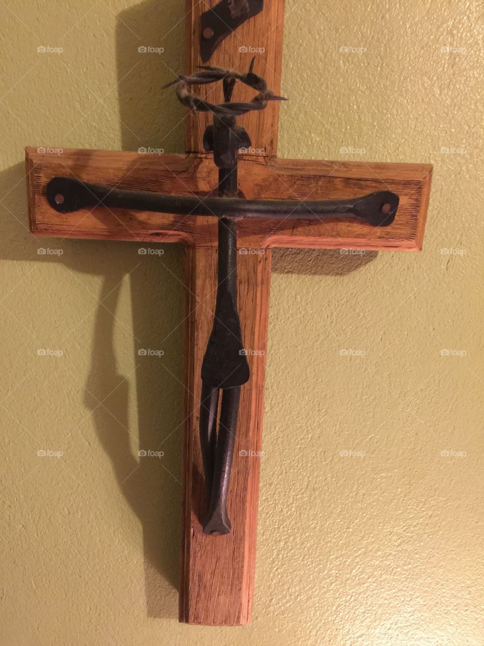 A cross of wood craft. God Jesus died on the cross for our sins and we are saved by Jesus 