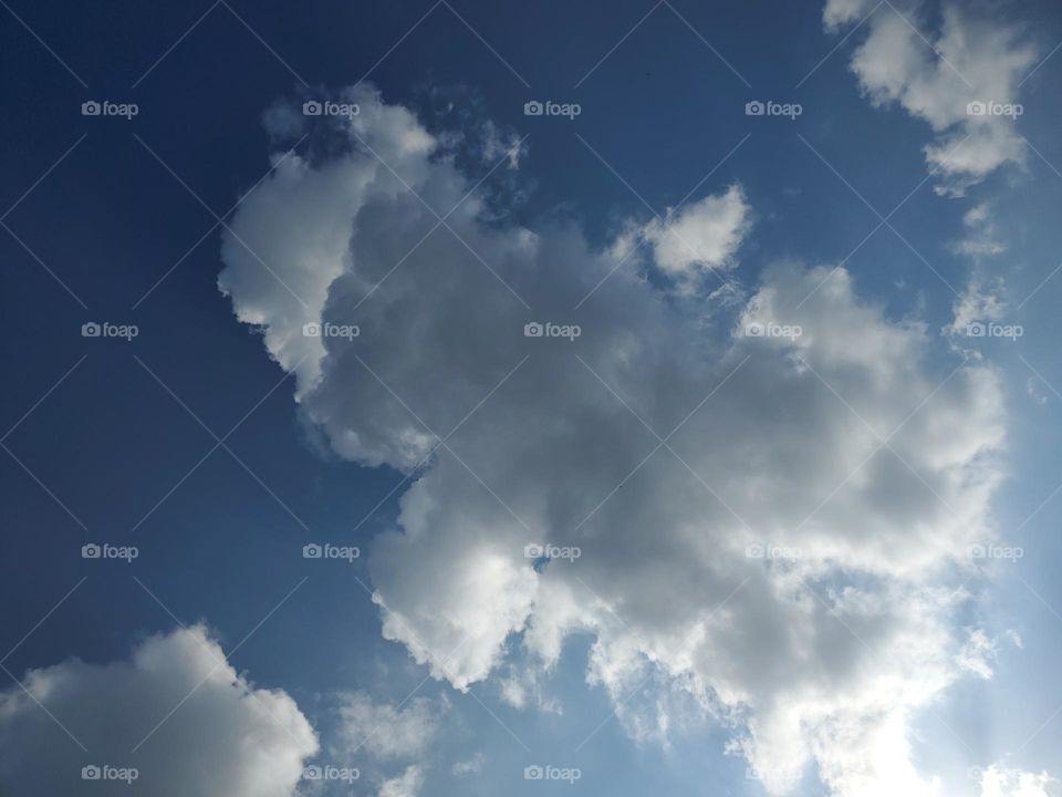 Cloud gazing? Take a break! Look up high! TWhat do you see?  I see the shape of a body with a head,legs,torso, and arms. A character, a person, or perhaps a gingerbread man! This is the original to the prior two creative characters.