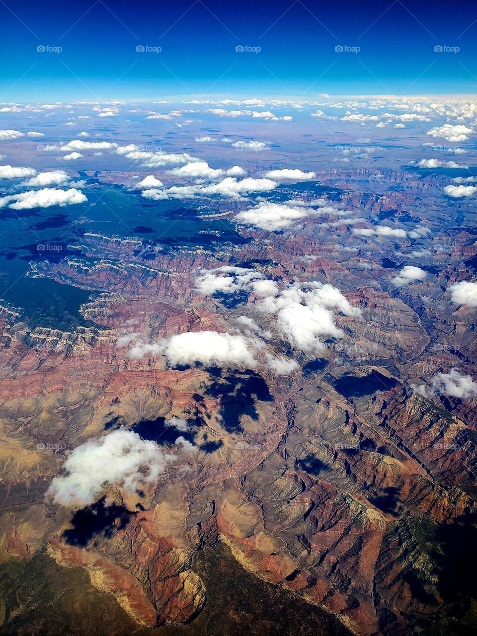 Clouds hover over the Grand Canyon