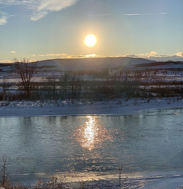 SUN OVER THE RIVER IN CALGARY