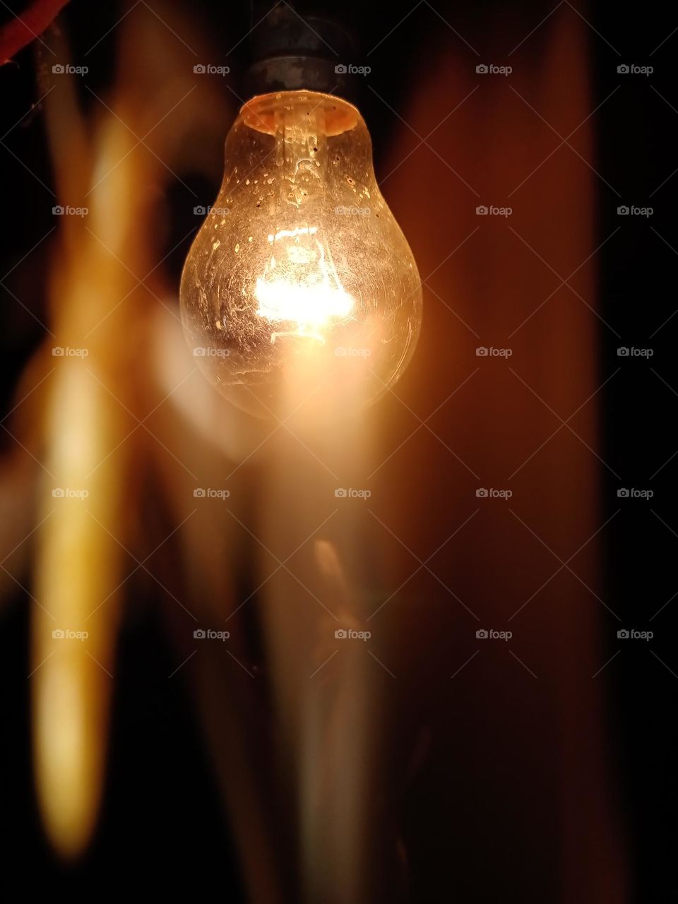 Nice view of glass light bulb with nice blur background effect clousup photo