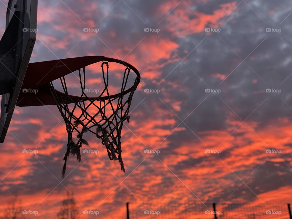 Crazy sunset with basketball net