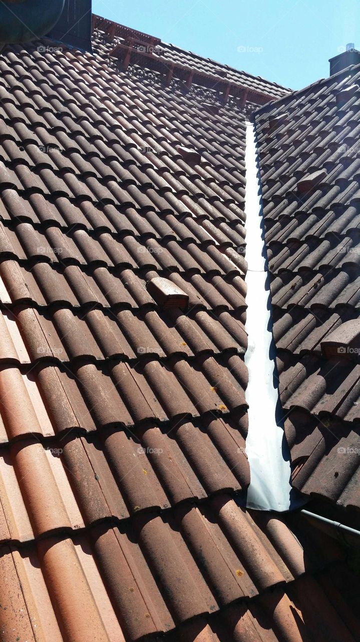 roof with bricks tiling rooftop
