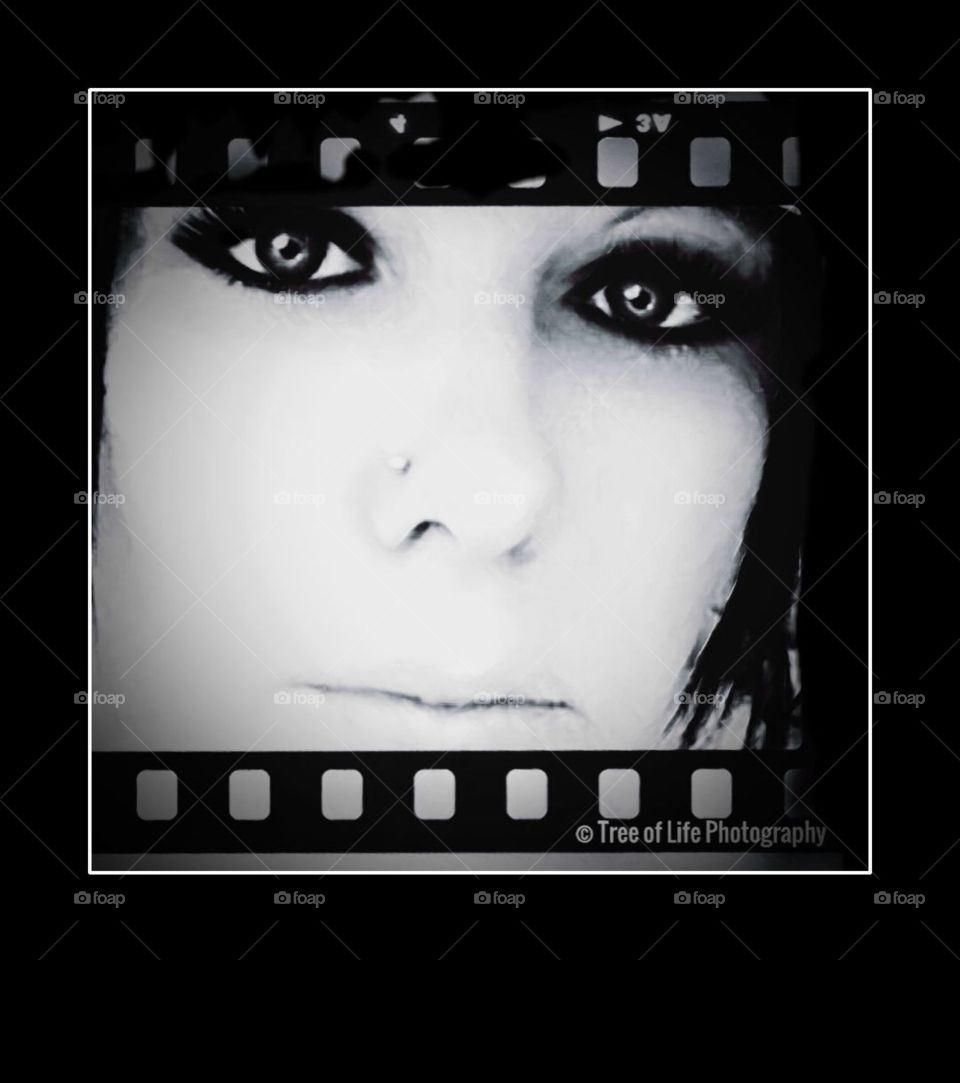 Black and white portrait of negative film magnified and framed...Beautiful, Natural Headshot