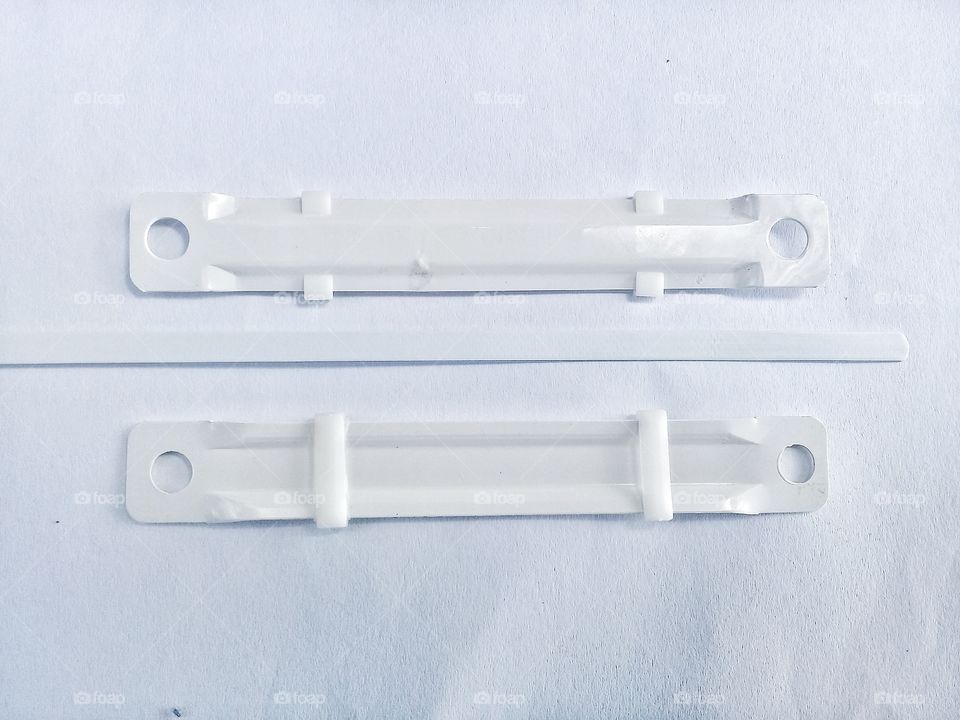 this model of paper fasteners is very simple made of plastic