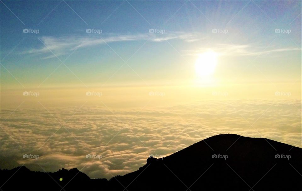 Golden sunrise scenery at the top of the mountain
