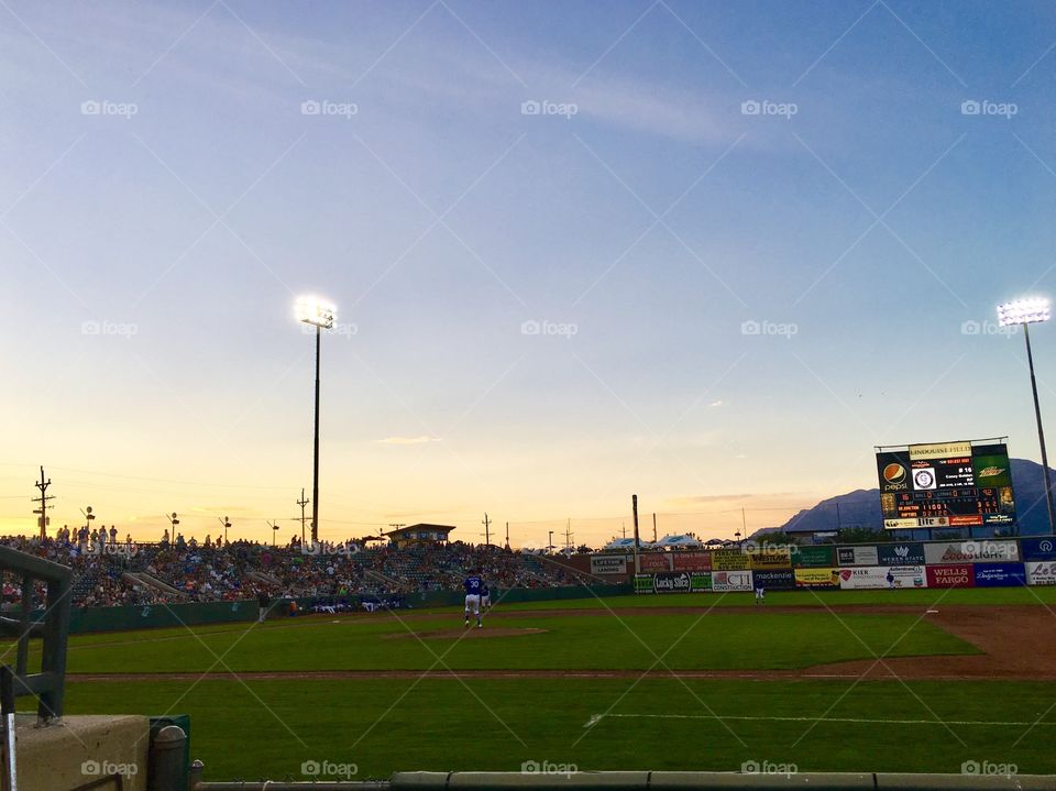 Endless Summer baseball games. Cool summer nights. Perfect evening. Beautiful surroundings. Competition. Play ball.