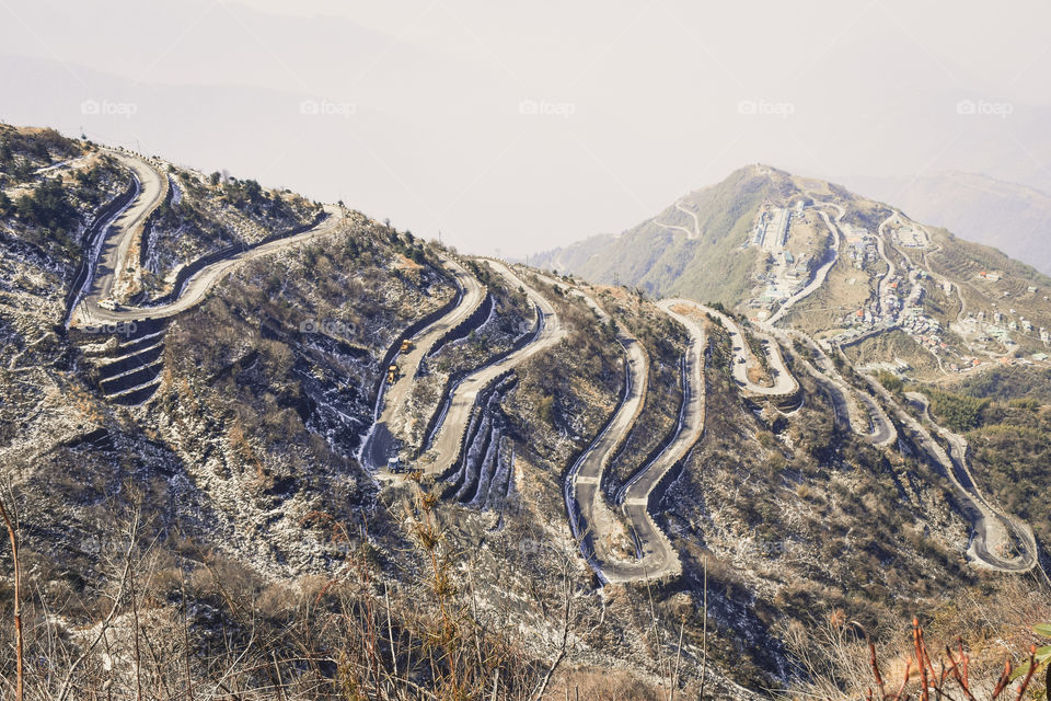 Zuluk hilltop the transit point of Silk Route From Thambi View Point. The road makes 32 hairpin turns. Located on rugged terrain of lower Himalaya in Sikkim. Historic Silk Route from Tibet to India.
