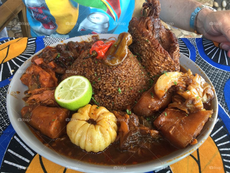 Traditional Senegalese meal of rice and fish with vegetables